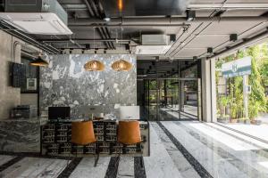 TV a/nebo společenská místnost v ubytování Bangkok City Link Hotel + 30 fotografií