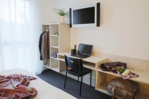 TV a/nebo společenská místnost v ubytování Topmotel
