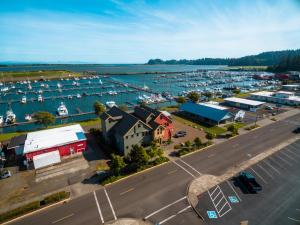 an aerial view of a harbor with boats at At The Helm Hotel in Ilwaco