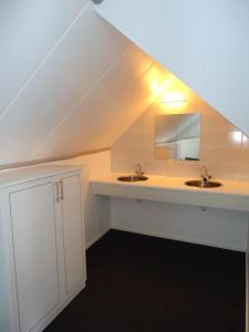 Kúpeľňa v ubytovaní Bed and Breakfast De Zeehoeve