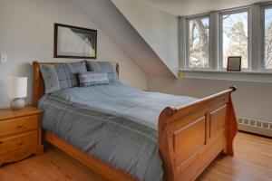 a bedroom with a bed and a dresser at Our Space the Perfect Place B&B in Picton