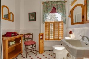 a bathroom with a sink, toilet and bathtub at Our Space the Perfect Place B&B in Picton