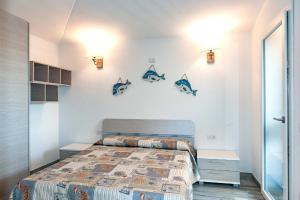 Posteľ alebo postele v izbe v ubytovaní VILLA PARADISE + 19 fotografií