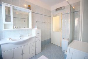 Kúpeľňa v ubytovaní Apartment Agnese