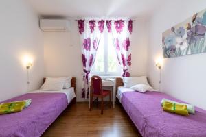 Marica Guesthouse客房内的一张或多张床位