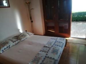 Postel nebo postele na pokoji v ubytování Apartmani Ujdur
