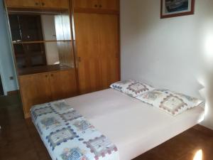 Postel nebo postele na pokoji v ubytování Apartmani Ujdur