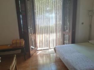 Postel nebo postele na pokoji v ubytování Apartmani Ujdur
