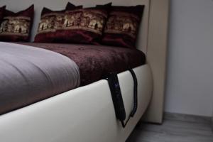 Postel nebo postele na pokoji v ubytování VIP suite hotel Heinz