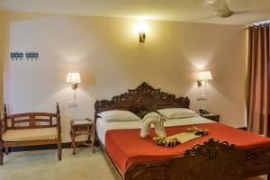 Voodi või voodid majutusasutuse Tembo Palace Hotel toas
