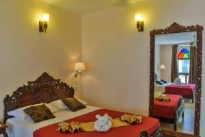 Voodi või voodid majutusasutuse Tembo Palace Hotel toas