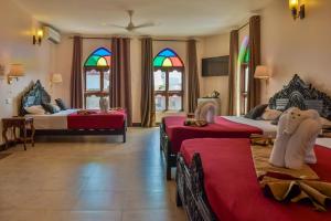 Voodi või voodid majutusasutuse Tembo Palace Hotel toas