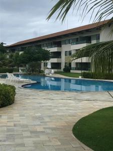 Bazén v ubytování Flat Carneiros Beach Resort nebo v jeho okolí