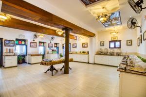 TV a/nebo společenská místnost v ubytování Tembo Palace Hotel