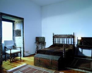 Uma cama ou camas num quarto em Convento de São Francisco