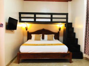 Postel nebo postele na pokoji v ubytování My Vigan Home Hotel