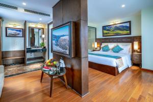 Postel nebo postele na pokoji v ubytování Sapa Relax Hotel & Spa + 37 fotografií