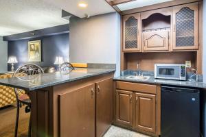 A kitchen or kitchenette at Plaza Inn & Suites