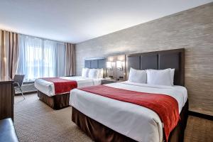 Postel nebo postele na pokoji v ubytování Comfort Inn & Suites South