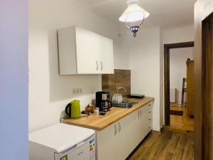 Η κουζίνα ή μικρή κουζίνα στο Casa Teutsch +5 φωτογραφίες