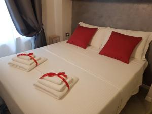 Postel nebo postele na pokoji v ubytování Il Sogno Torino Guesthouse