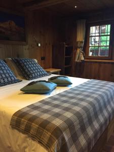 Wongade Chambres d'hotes e Restaurant客房内的一张或多张床位