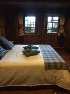 Wongade Chambres d'hotes e Restaurant客房内的一张或多张床位