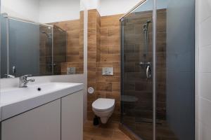 Koupelna v ubytování Nowe Apartamenty Puck + 29 fotografií
