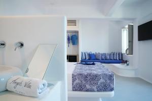 Postel nebo postele na pokoji v ubytování Angels Pillow Luxury Boutique Residence - Adults Only