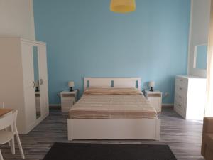 Postel nebo postele na pokoji v ubytování Lipari Suite Apartament