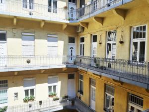 A balcony or terrace at Folk Art Apartment near Blaha Lujza Square