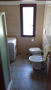 Koupelna v ubytování Case Vacanze Corongiu