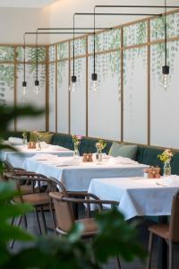 Reštaurácia alebo iné gastronomické zariadenie v ubytovaní VillaVerde Aparthotel