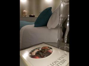 A bed or beds in a room at L'albero Di Famiglia