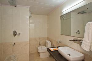 Kopalnica v nastanitvi Hotel Hayer Regency