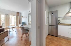 Kuchyň nebo kuchyňský kout v ubytování Apartamentos Costaluz Las Dunas