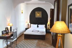 מיטה או מיטות בחדר ב-Riad Kasbah & Spa