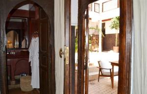 a doorway leading to a room with a door open at Riad Kasbah & Spa in Marrakesh