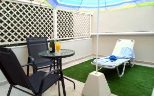 Area soggiorno di Caravel Hotel Apartments