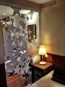 Postel nebo postele na pokoji v ubytování Hotel Europa Life