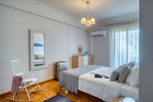Ένα ή περισσότερα κρεβάτια σε δωμάτιο στο Plaza Filellinon