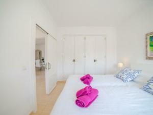 Ein Bett oder Betten in einem Zimmer der Unterkunft Apartment in Alcúdia with Bay of Pollensa View