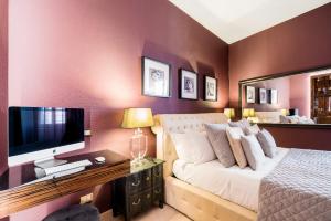 Letto o letti in una camera di The Brunetti - Luxury serviced apartment