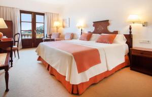 Кровать или кровати в номере Es Moli Hotel