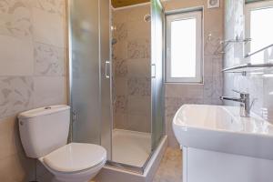 Kúpeľňa v ubytovaní Apartamenty Gromada Międzyzdroje