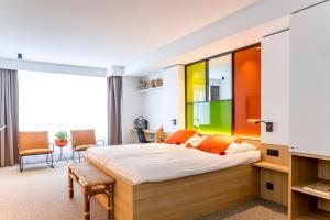 Postel nebo postele na pokoji v ubytování Hotel Nelson + 37 fotografií