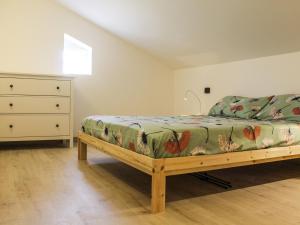 Кровать или кровати в номере La Dimora apartments
