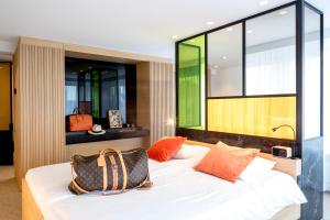 Voodi või voodid majutusasutuse Hotel Nelson toas