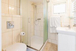 Kúpeľňa v ubytovaní Apartamenty Gromada Międzyzdroje