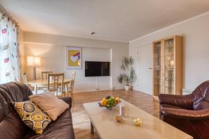 TV a/nebo společenská místnost v ubytování Trondheim Leilighetshotel